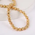 Perle di pietra lavica naturale con una finitura dorata galvanica per i gioielli - 4mm / Oro KC