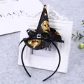 Halloween witch hat headband featuring gold pumpkin prints and a black bow detail - Black and Gold Pumpkin Star Style