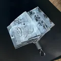 Clear automatic three-fold umbrella with black calligraphy script design and storage sleeve - Manual / Art Calligraphy Pattern