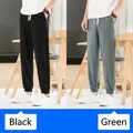 Pantalon de jogging élégant pour homme en mélange de coton et de lin noir et vert - Noir Et Vert