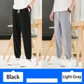 Pantalon de jogging décontracté en coton et lin pour homme en noir et gris clair - Noir et Gris Clair