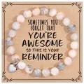 Handmade natural pink zebra stone beaded bracelet with heart charm on gift card - Pink Zebra Heart Awesome