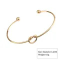 Elegant gold-tone knot cuff bracelet featuring a 6.6cm diameter and 8.3g weight detail - Knot (Style 4 Gold)