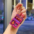 Mini retro pink slot machine keychain with electroplated finish and lever detail - Suncity Style / Pink