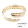 Elegant gold alloy open cuff bracelet featuring detailed feather leaf texture for women - Style 10 Gold