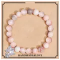 Handmade pink zebra stone beaded bracelet featuring a sparkling butterfly charm gift - Pink Zebra Butterfly Elastic Cord