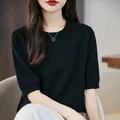 Elegant black 100% cotton short-sleeved knitted T-shirt for women in a relaxed loose fit - S / Black