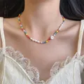 Handmade colorful beaded necklace with pearls and a cute white daisy flower charm - Multicolor Crystal Shell