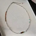 Elegant silver beaded necklace featuring pearls, tiger's eye stones and turquoise - Silver Flakes Tiger Eye