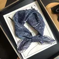Elegant 55cm blue paisley print square scarf in breathable silk and cotton blend fabric - Navy Totem