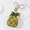 Sparkling rhinestone pineapple keychain with leather base and silver clasp bag charm - Lemon Yellow