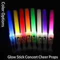 Set of eight colorful LED glow sticks with glitter finish for concerts and parties - Hand Stick