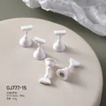 Set of white magnetic chess piece style nail display stands for press-on nail art tools - White