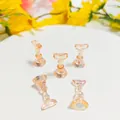 Iridescent aurora chess-shaped nail art display stand for press-on nails showing magnetic base - Aurora Yellow Oval Head
