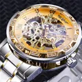 Detailed macro view of gold skeleton mechanical watch with rhinestone bezel - Gold Dial Two-tone