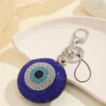 Porte-clés œil turc fait main avec strass bleus pavés et fermoir mousqueton en métal argenté - Oeil Rond