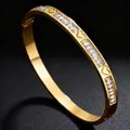 Elegant 18k gold plated stainless steel heart bangle with sparkling crystal accents for women - Gold Heart Zirconia Style (44乙-E-8)