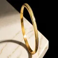 Elegant gold stainless steel frosted bangle for women featuring a luxury matte finish - Frosted Minimalist Style (44-D-3) / 4mm Width / Gold