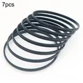 Set of seven minimalist black titanium steel stackable bangles for a layered look - Inner Diameter 55mm / 7 Rings / Black