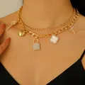 Elegant punk style gold three-layer chain necklace with heart lock and clover charms - Gold Punk Multi-Element Combination Necklace (KC Gold 2631)