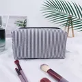 Black and white vertical striped seersucker cosmetic bag with large capacity storage - Black (Regular Zipper)