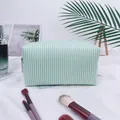 Large seersucker striped cosmetic bag in green and white, ideal for travel storage - Light Green (Regular Zipper)