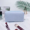 Blue and white striped seersucker cosmetic bag with large capacity for travel storage - Light Blue (Regular Zipper)
