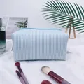 Light blue and white seersucker striped makeup bag with zipper closure for travel - Water Blue (Regular Zipper)