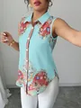 Detailed view of women's turquoise sleeveless shirt with intricate floral paisley print - Mint Green Paisley Floral (WXCS-0013)
