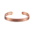 Vintage copper magnetic open bangle featuring a traditional Celtic spiral pattern design - Infinity