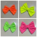 Neon colored large solid bow hair clips with spring clips in four vibrant fluorescent colors - Duckbill Clip 4-Piece Set / Colorful