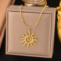 Elegant gold necklace featuring a unique textured sunburst pendant on a jewelry box display - Vortex Sun (AH1242) / Gold