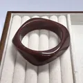 Stylish brown resin bangle with a unique curved design and subtle marble texture finish - Geometric Rhombus / Inner Diameter 65mm / Coffee