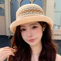 Elegant beige knitted bucket sun hat with geometric pattern for beach vacations - Wavy Beige With Curled Edges