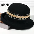 Black knitted bucket hat with elegant gold geometric zigzag pattern for women - Black With Wavy Edges