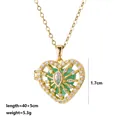 Detailed view of gold heart locket necklace with green natural stone and crystal inlay - Green