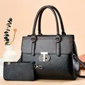 Élégant ensemble de sacs à main noirs en similicuir avec boucle dorée et pochette assortie - 30*13*22 / Noir