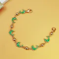 Braccialetto bohémien dorato con ciondoli a forma di delfino verde - Stile Delfino Verde (B004)