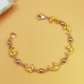 Bracciale bohémien dorato con ciondoli a forma di delfino in smalto giallo e perle - Stile Delfino Giallo (B002)