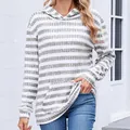 Close-up detail of women's casual gray and white striped hooded sweatshirt with pocket - S / Light Gray