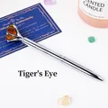 Elegant silver metal ballpoint pen topped with a natural raw Tiger's Eye crystal stone - Tiger Eye Raw Stone (6186451919096)