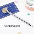 Elegant silver metal ballpoint pen adorned with a natural raw yellow citrine crystal - Citrine Raw Stone (6186451919082)