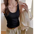 Classic black ribbed slim fit tank top for women with a stylish scoop neck design - S / Black