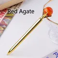 Elegant golden metal ballpoint pen featuring a natural red agate stone crystal bead - Red Agate Sphere Style (6186451919091)
