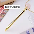 Elegant golden metal ballpoint pen topped with a natural rose quartz crystal sphere - Rose Quartz Sphere Style (6186451919101)