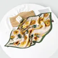Elegant pleated 70cm square silk-like scarf featuring a vibrant sunflower print - 70cm / Sunflower