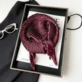 Burgundy pleated silk scarf with white teardrop patterns shown on stylish tray - 70cm / Wine Red Paisley