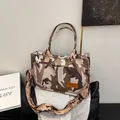 Large capacity camouflage shoulder bag with an adjustable strap and convenient front pockets - 34*11.5*21 / Khaki Camouflage