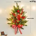 Pre-lit Christmas teardrop swag with red poinsettia, berries, and striped bow for wall decor - Striped Red Swag With LED Lights