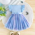 Detailed view of the star and moon sequin mesh skirt on this blue princess dress - Sky Blue 50839b / 80 (12-18 Months)